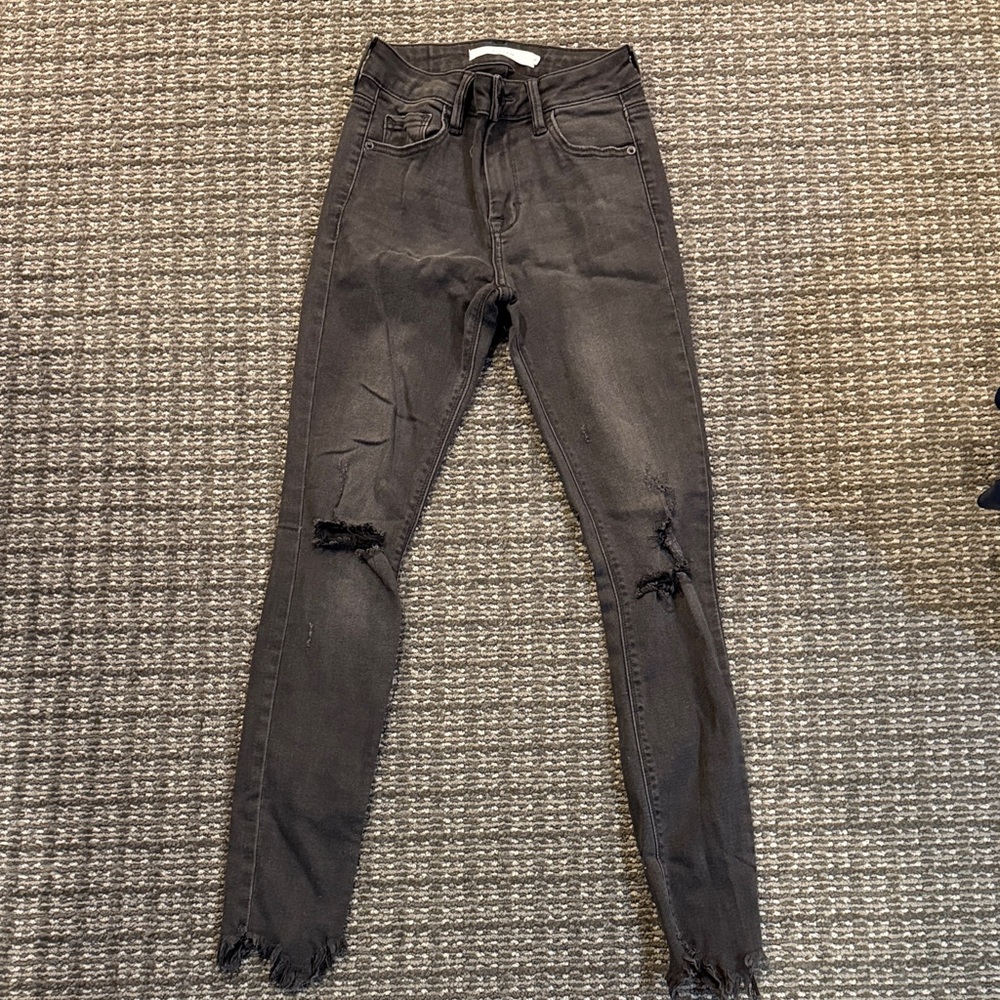 Black Distressed Skinny Jeans. Size 24